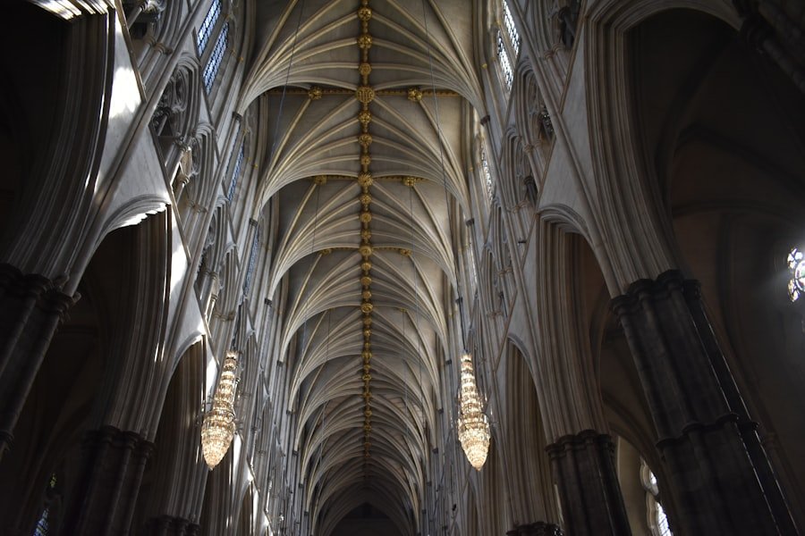 The west front of Westminster Abbey on a sunny day with visitors gathered outside