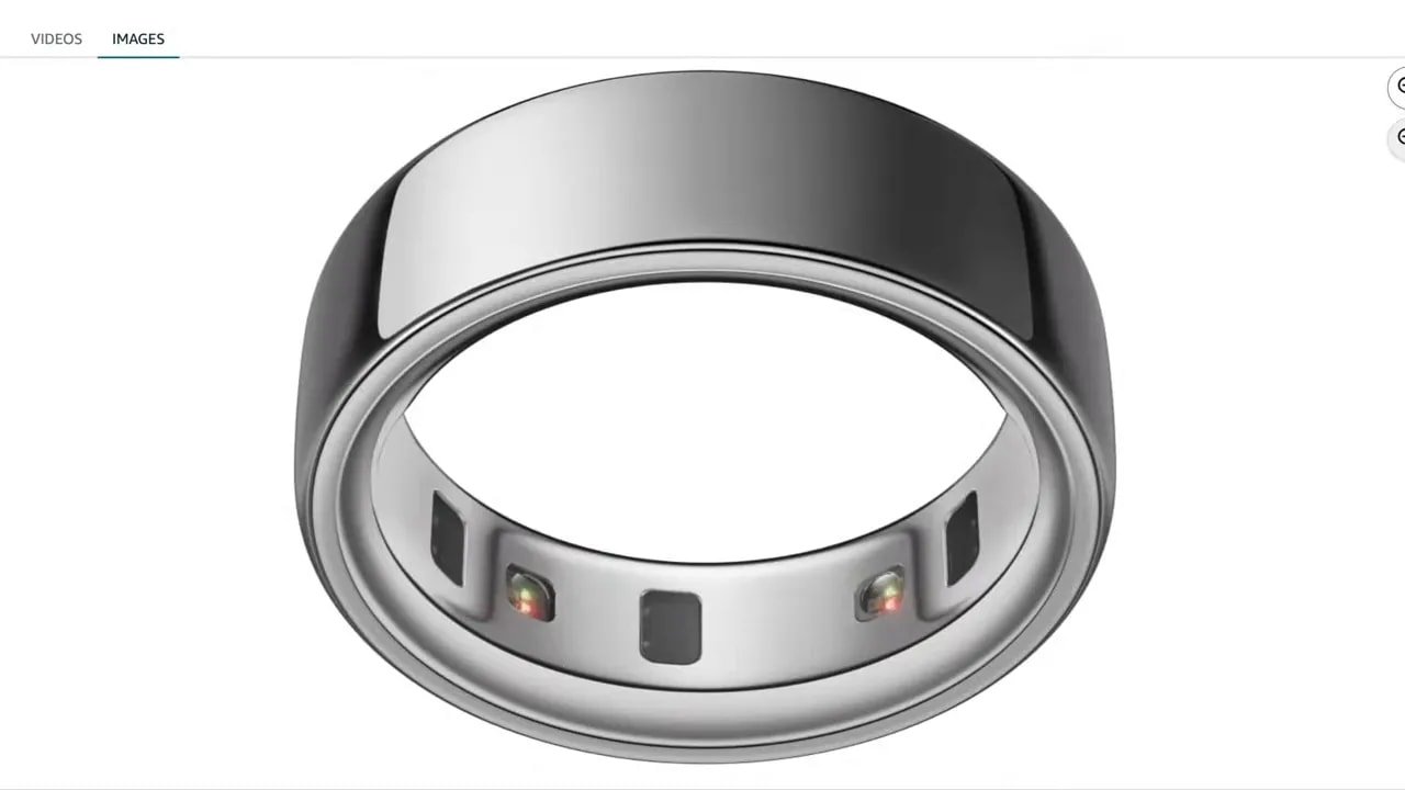 Silver Oura Ring shown close-up with sensors visible on the inside